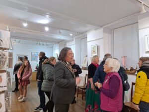 People at exhibition preview evening